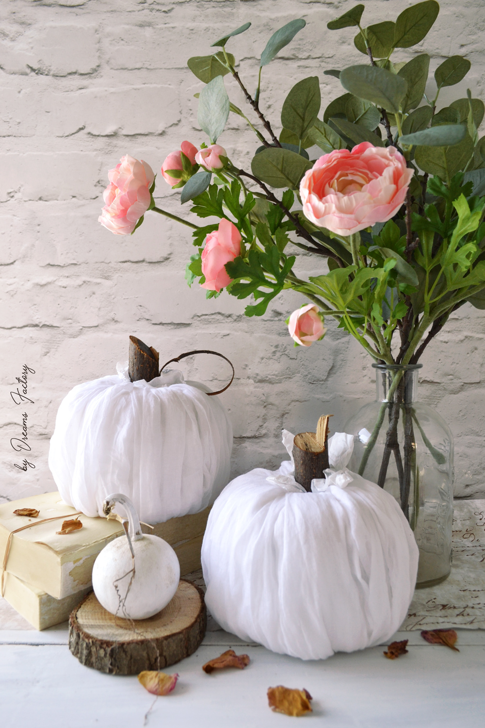 Make these stunning DIY no-sew fabric pumpkins in just 5 minutes and use them all over your home for beautiful fall decorating - by Dreams Factory
